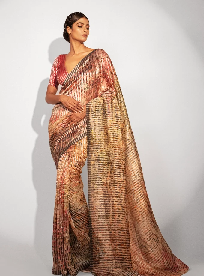 Unallume Floral Print saree designs Unique saree designs Artisan saree designs Indian print sarees Printed saree party wear Printed saree silk print Saree, Golden saree Unallume, Metallic Golden Red Gray designer saree bollywood saree indian saree silk saree fashion art inspired fashion handloom trendy cocktail saree party wear artistic fashion fashion trends indian saree tissue organza pure silk ready to wear saree cotton saree printed saree handloom saree