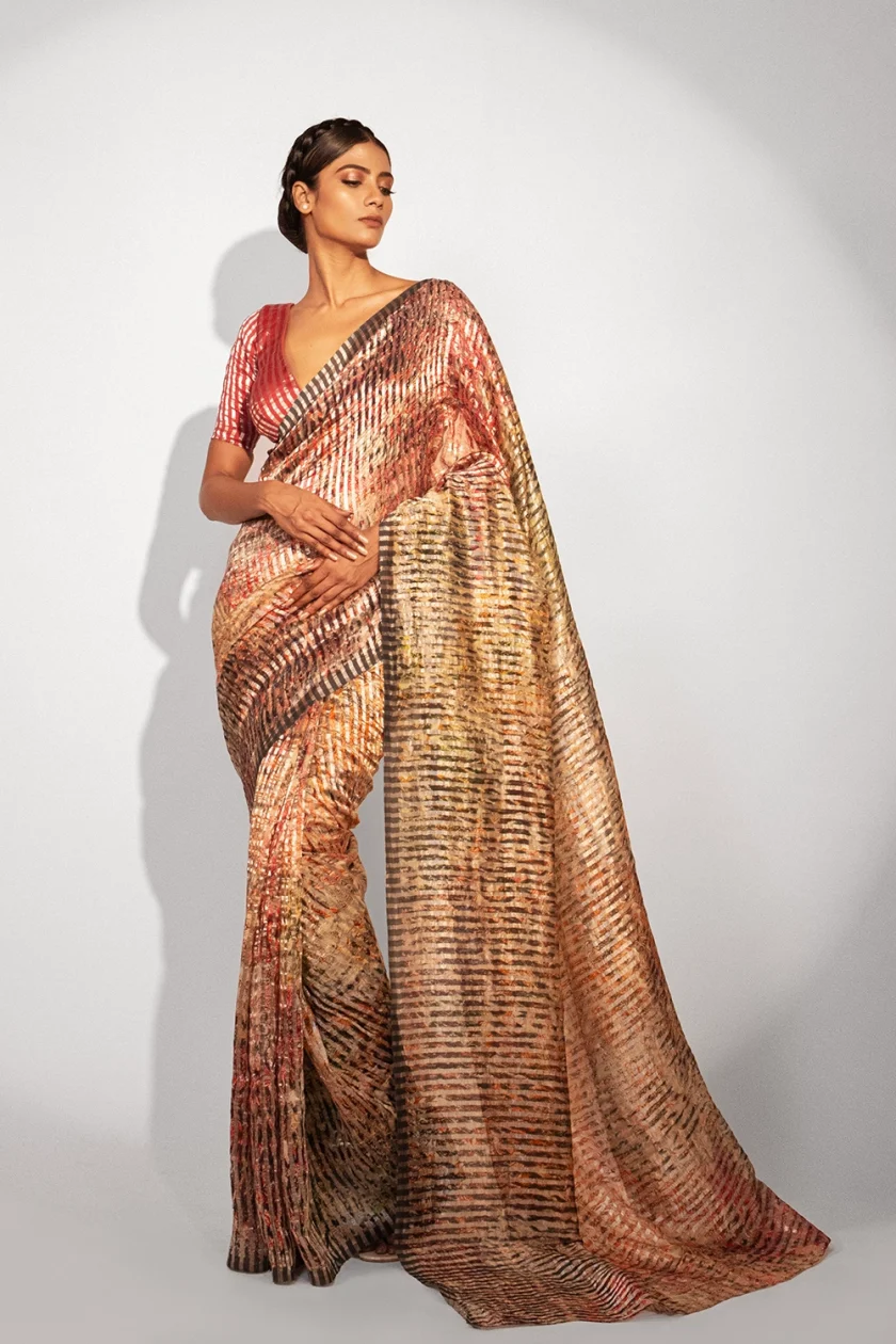 Unallume Floral Print saree designs Unique saree designs Artisan saree designs Indian print sarees Printed saree party wear Printed saree silk print Saree, Golden saree Unallume, Metallic Golden Red Gray designer saree bollywood saree indian saree silk saree fashion art inspired fashion handloom trendy cocktail saree party wear artistic fashion fashion trends indian saree tissue organza pure silk ready to wear saree cotton saree printed saree handloom saree