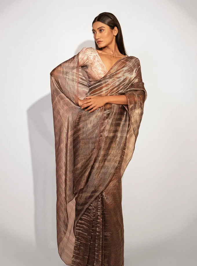 Unallume Print saree designs Unique saree designs Artisan saree designs Indian print sarees Printed saree party wear Printed saree silk Cocktail Saree, Party wear saree, Unallume, Metallic Golden Red Gray designer saree bollywood saree indian saree silk saree fashion art inspired fashion handloom trendy cocktail saree party wear artistic fashion fashion trends indian saree tissue organza pure silk ready to wear saree cotton saree printed saree handloom saree